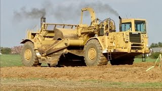 Large Caterpillar Earth Movers and Water Truck Working [upl. by Milton121]