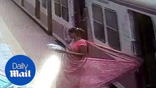 Horrifying moment women dragged after saree got stuck in train [upl. by Lawton841]