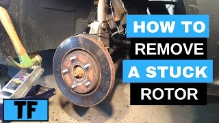 How To Remove A Rusted or Stuck Brake Rotor  DIY Easy Tips [upl. by Giuditta]