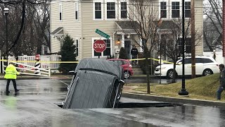 SUV falls into sinkhole caught on camera [upl. by Seligmann]